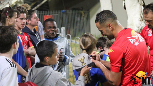 Adelaide United players talk to locals during their recent visit to the Top End. Photo: AdelaideUnited.com.au