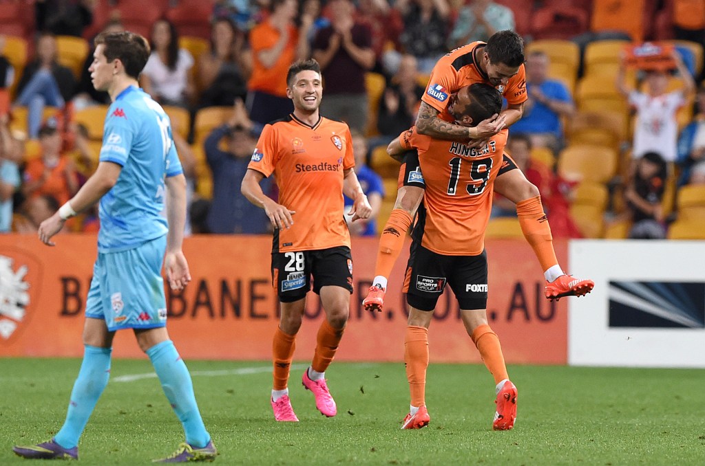 Brisbane's Jamie MacLaren celebrates after scoring a goal against Adelaide United.
