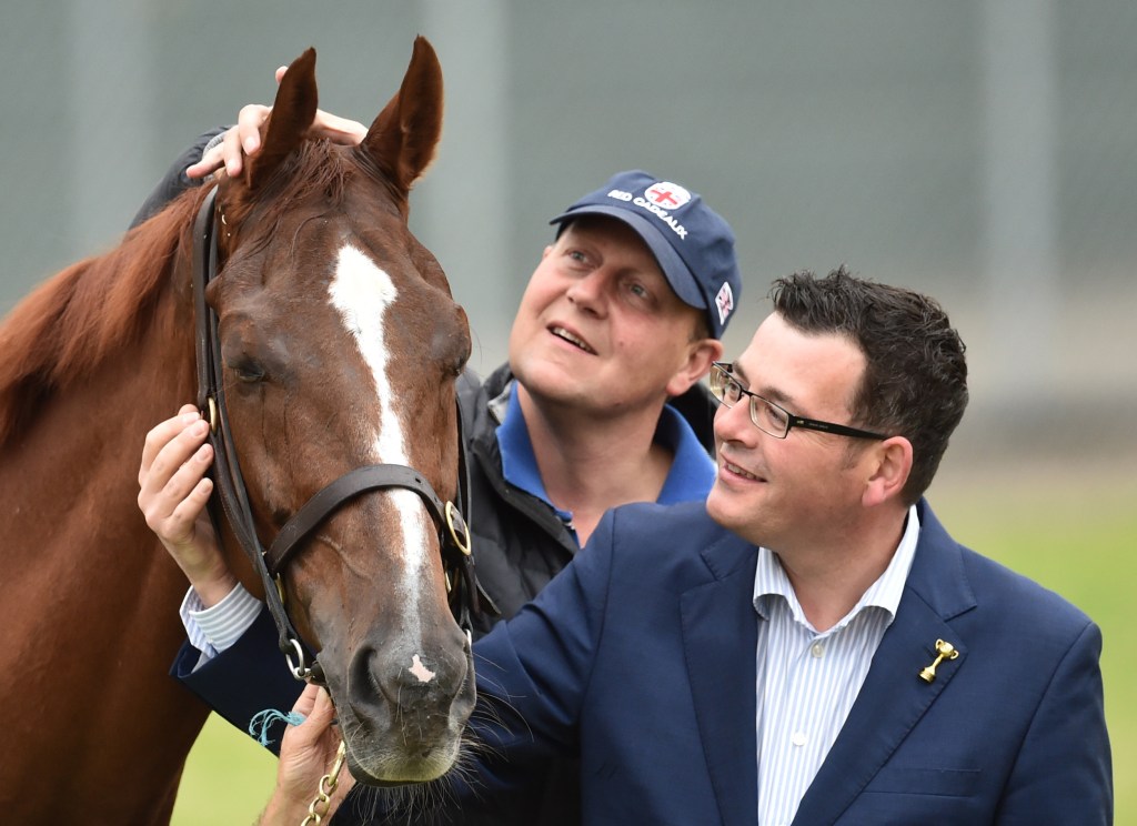 Victorian Premier Daniel Andrews has an eye for a photo op, getting to know sentimental Melbourne Cup favourite Red Cadeaux and trainer Ed Dunlop yesterday.