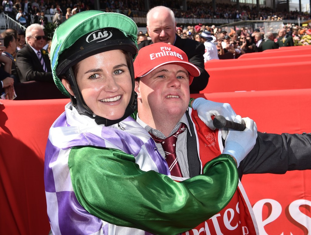 Michelle and brother Steven celebrate after she rode Prince of Penzance to victory in the Melbourne Cup.