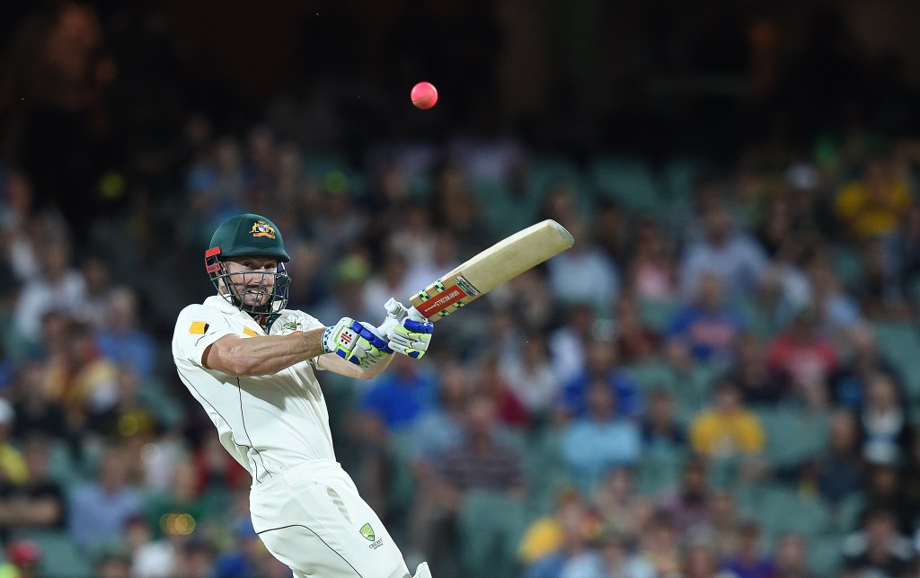 Australian batsman Shaun Marsh hits a boundary in the fourth innings in Adelaide. AAP Image/Dave Hunt
