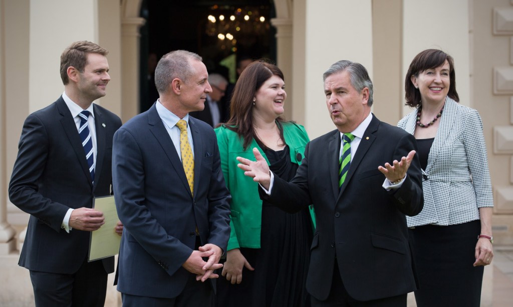 'Labor's action is working': Premier Jay Weatherill and former SA Governor Kevin Scarce with new cabinet members Stephen Mullighan, Zoe Bettison and Susan Close after their swearing-in last year. 