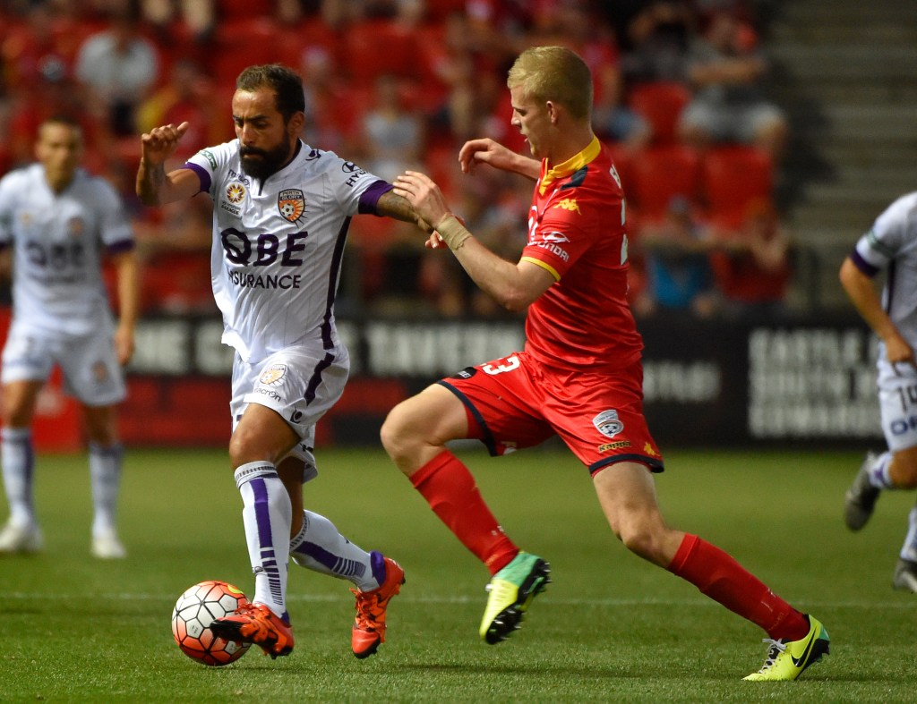 Jordan Elsey intercepts Perth Glory's Diego Castro. Photo: David Mariuz/AAP