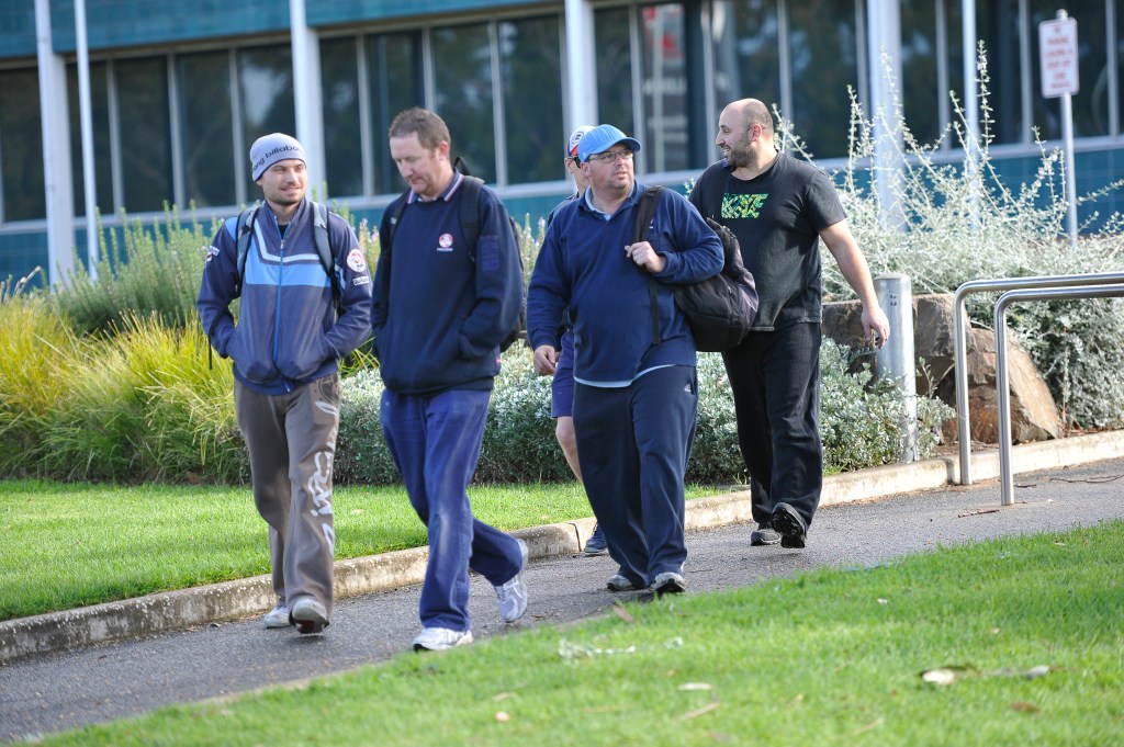 Holden workers finish their shift after a round of retrenchments last year. Photo: David Mariuz, AAP.
