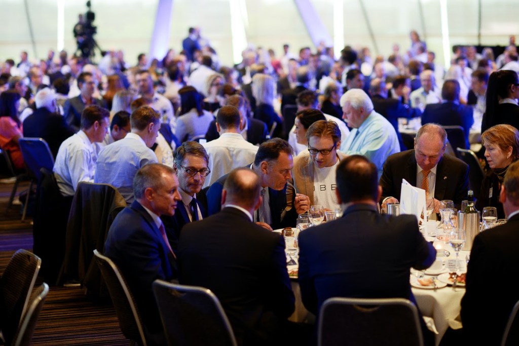 Uber Australia's general manager David Rohrsheim (centre) has had a fraught relationship with the Government of Jay Weatherill (left). The pair are pictured seated together at InDaily's Business Index luncheon in October. 