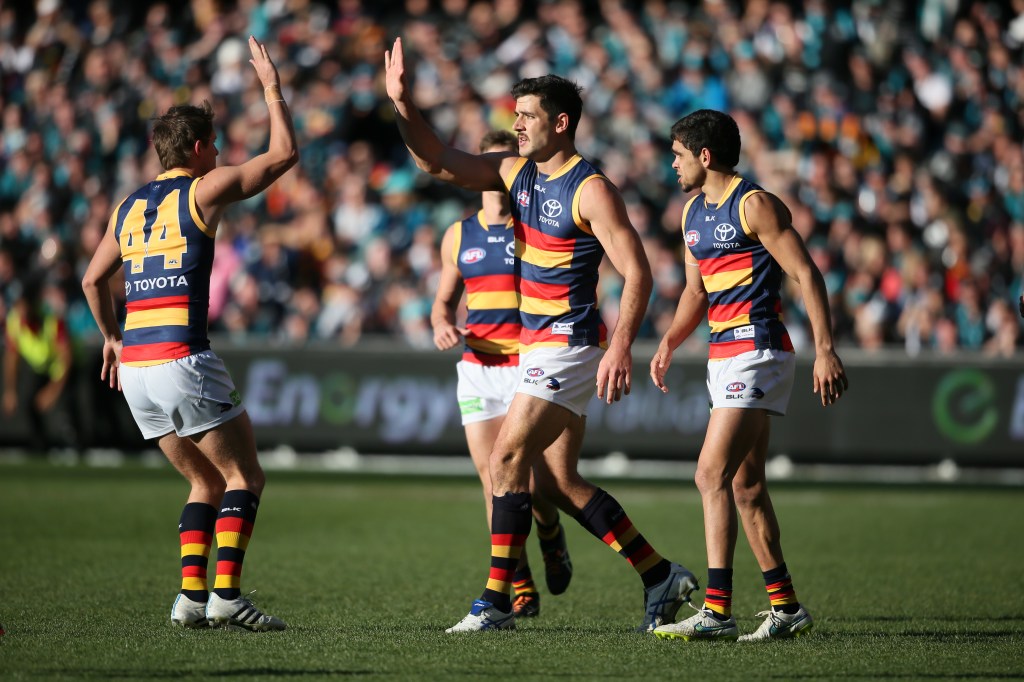 Taylor Walker and Matt Crouch celebrate a goal during last year's emotional Round 16 Showdown. Photo: Ben Macmahon, AAP.