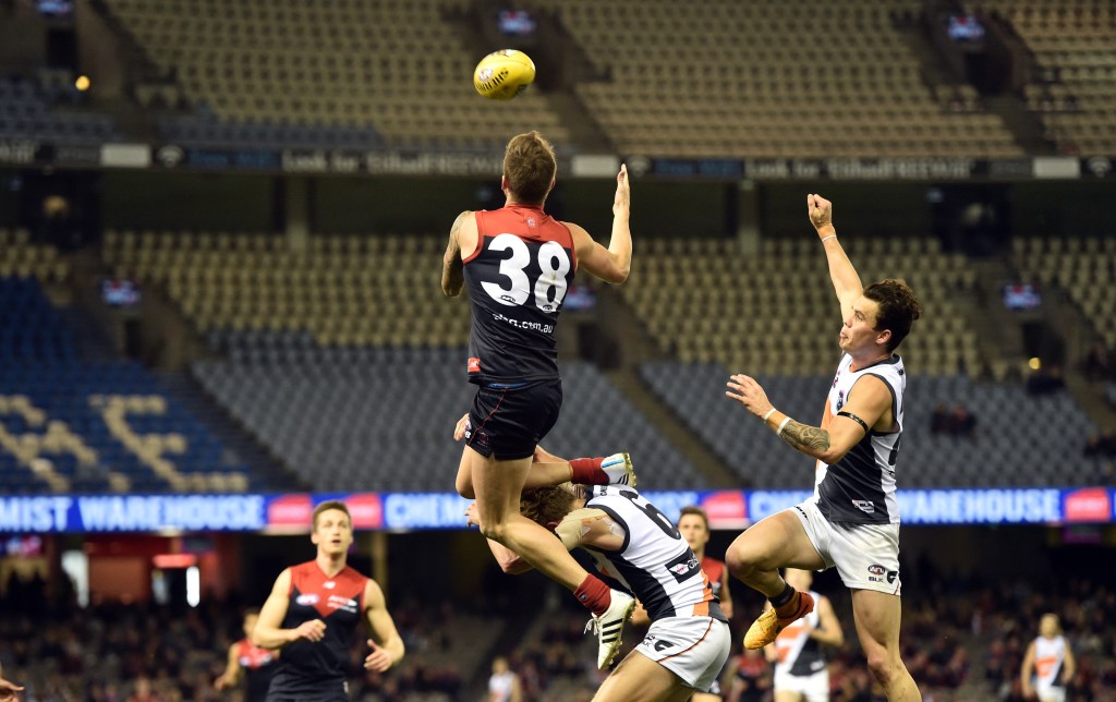 Former Demon Howe is renowned for screamers, but apparently not so adept at catching a frisbee. Photo: Julian Smith, AAP.