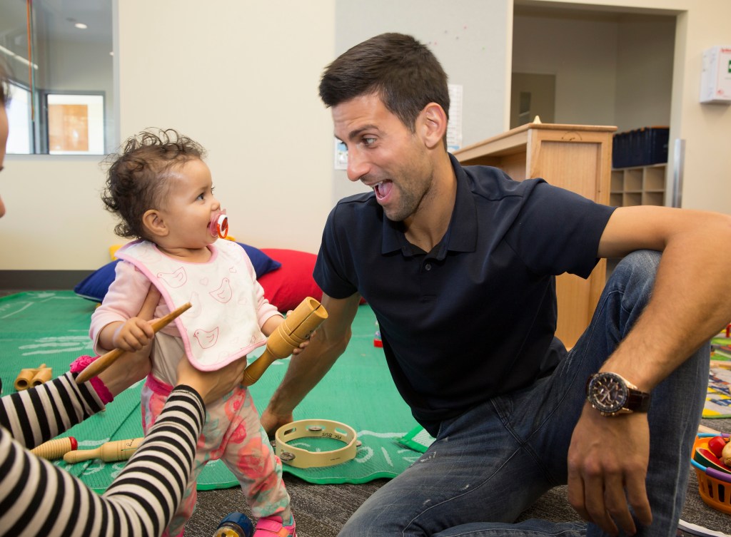 Novak Djokovic in Melbourne yesterday at Mission's Braybrook Early Learning Centre, to which he donated $20,000. Photo: Fiona Hamilton, AAP.