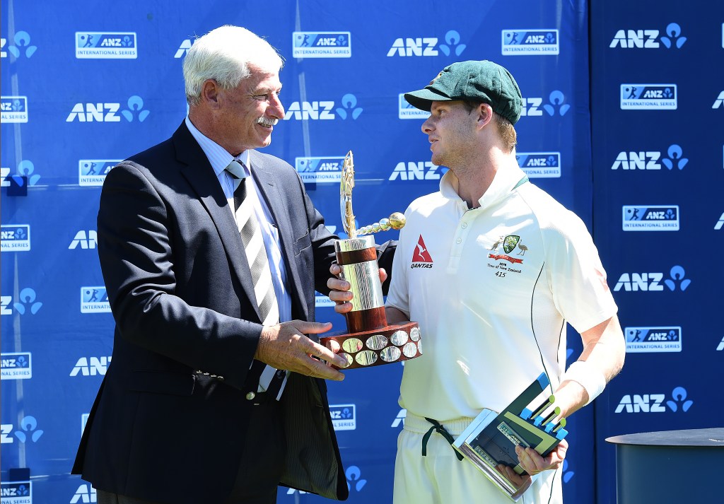 Sir Richard Hadley presents Steve Smith with the Trans-Tasman Trophy. Photo: Dave Hunt, AAP.