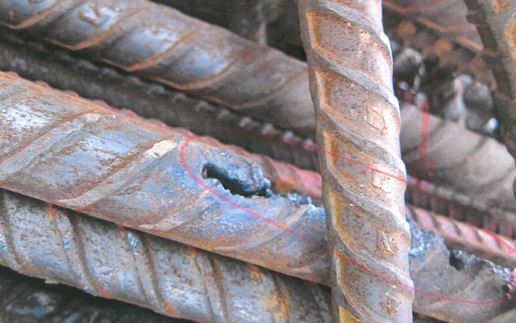 The transport department claims damaged steel reinforcement was replaced before concrete was poured onto it, but workers from the site tell a different story.