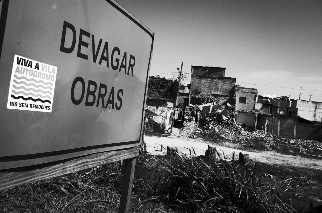 Construction work for the Rio 2016 Olympic Park is seen near the Vila Autodromo favela in Rio de Janeiro, Brazil. Photo: Lukas Coch, AAP.