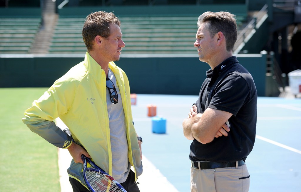 Australian Davis Cup team captain Lleyton Hewitt chats with former Davis Cup player Todd Woodbridge. Photo: Joe Castro, AAP.