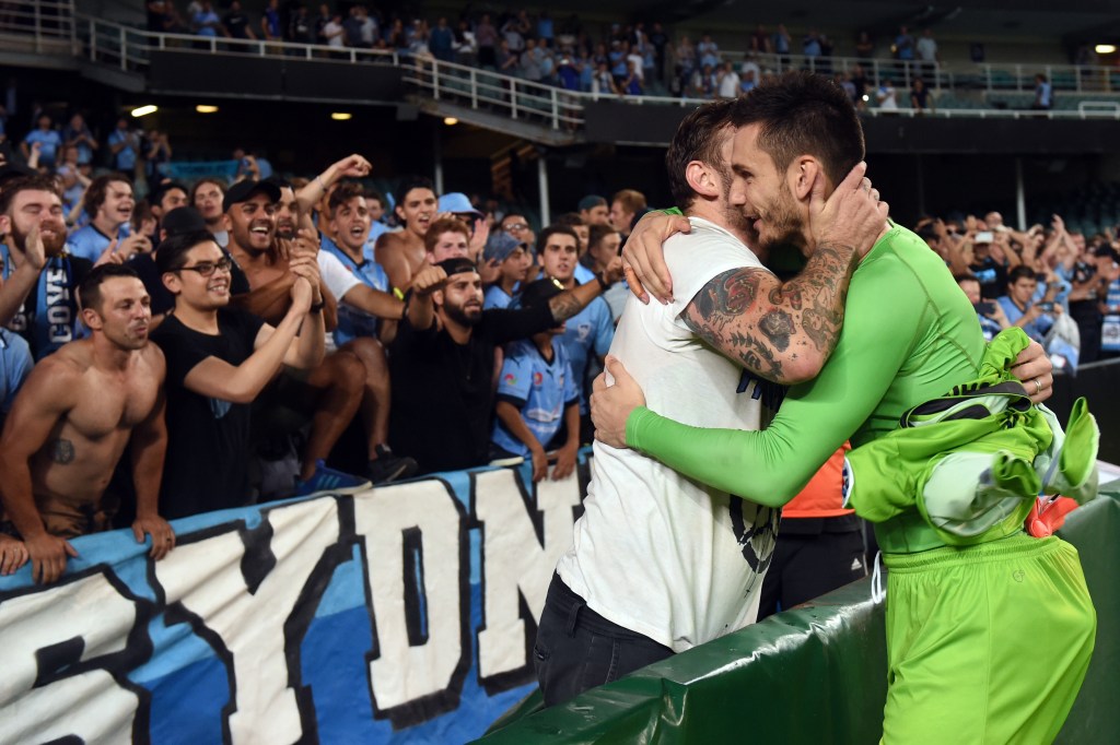 Sydney's Vedran Janjetovic celebrates with fans after the win. Photo: Paul Miller, AAP.