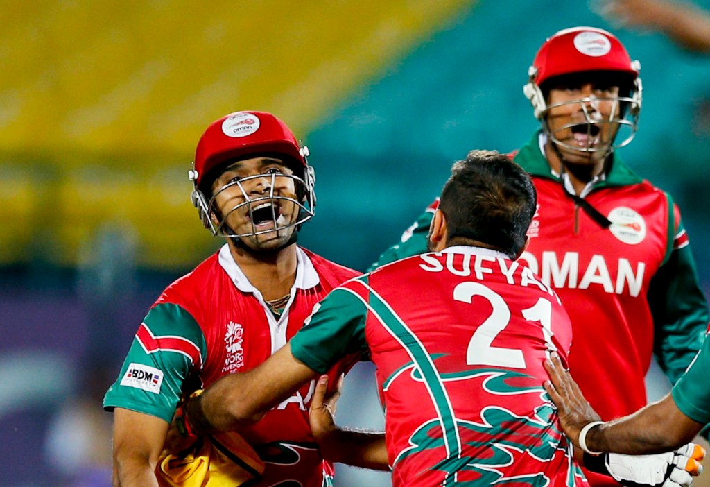 Wild celebrations as Oman beat Ireland in their first ICC World Twenty20 match. Photo: Tsering Topgyal, AP.