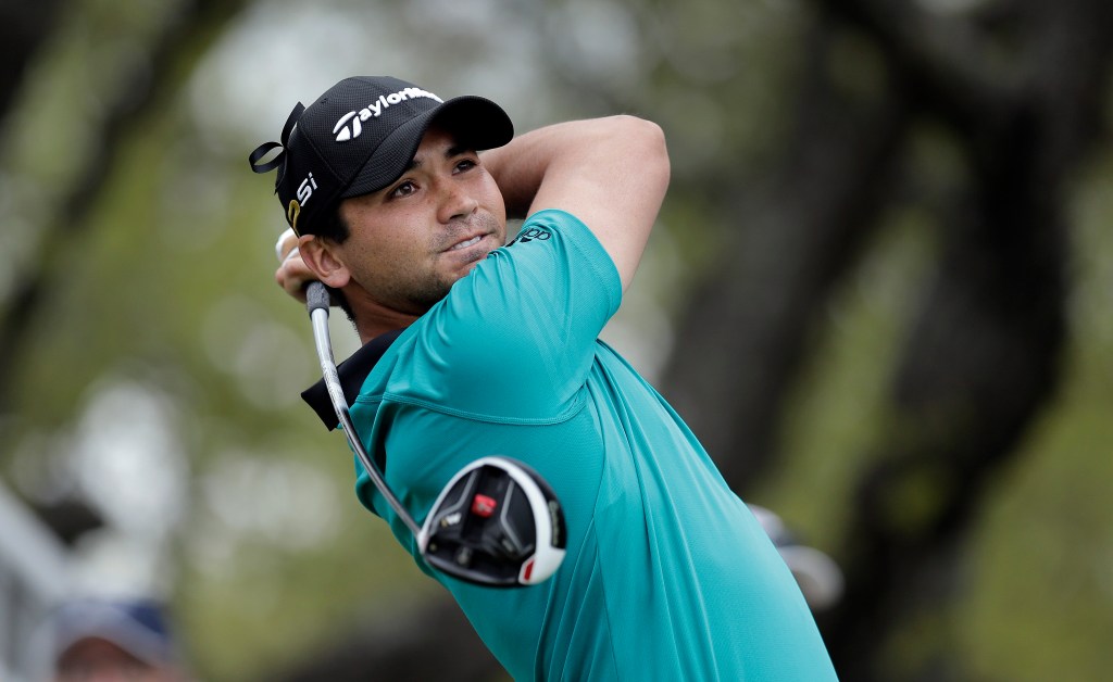 Jason Day watches his tee shot on the first hole during round-robin play against Graeme McDowell at the Dell Match Play Championship golf tournament at Austin County Club. Photo: Eric Gay, AP.