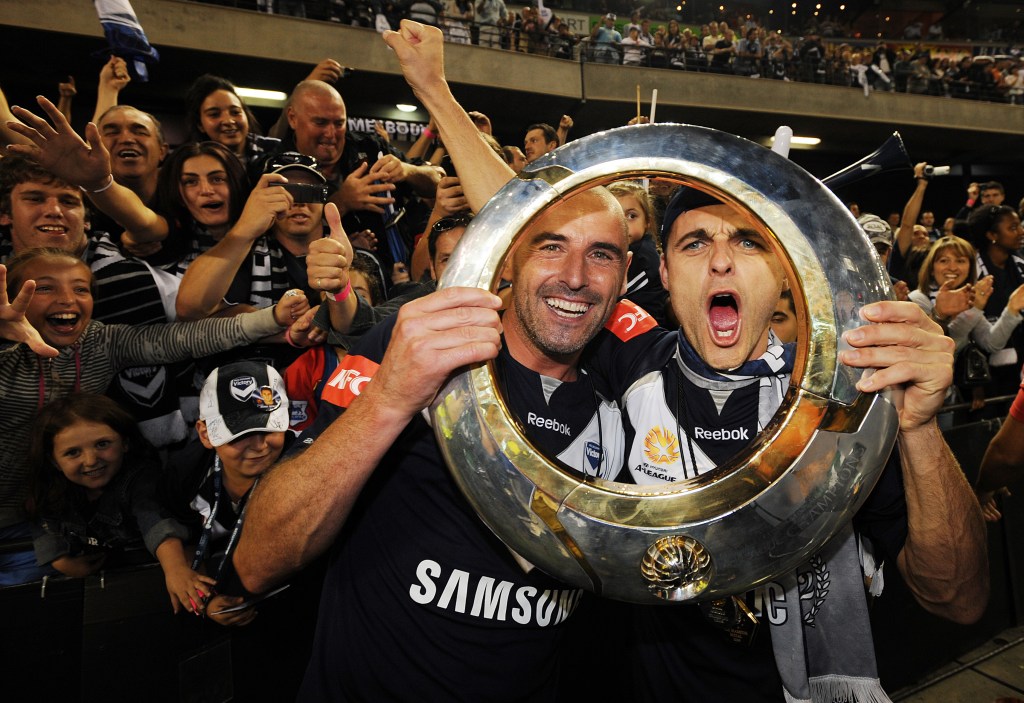 HAPPY MEMORIES: Melbourne Victory's Kevin Muscat celebrates with team-mate Tomislav Pondeljak after beating Adelaide United in the 2009 A-League final. God bless 'em! Photo: Joe Castro, AAP.
