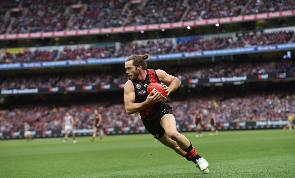 Travis Colyer in action for Essendon during last year's Anzac Day clash. He will be suspended for the re-match this long weekend. Photo: Julian Smith, AAP.