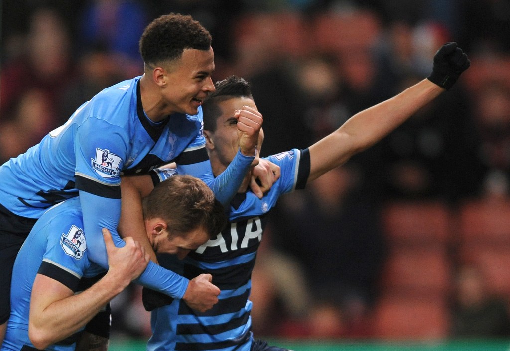 Tottenham's Harry Kane, bottom left, celebrates scoring a goal with Dele Alli, top, and Erik Lamela during their rout of Stoke City. Photo: Rui Vieira, AP.