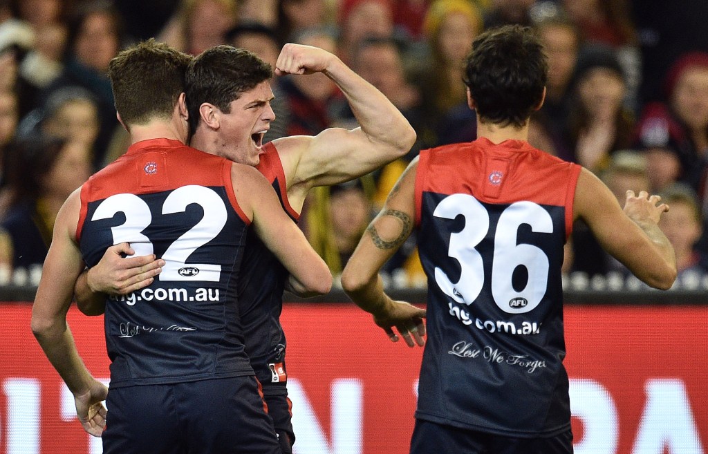 Angus Brayshaw joins teammates to celebrate during Melbourne's win over Richmond last weekend. Photo: Julian Smith, AAP.