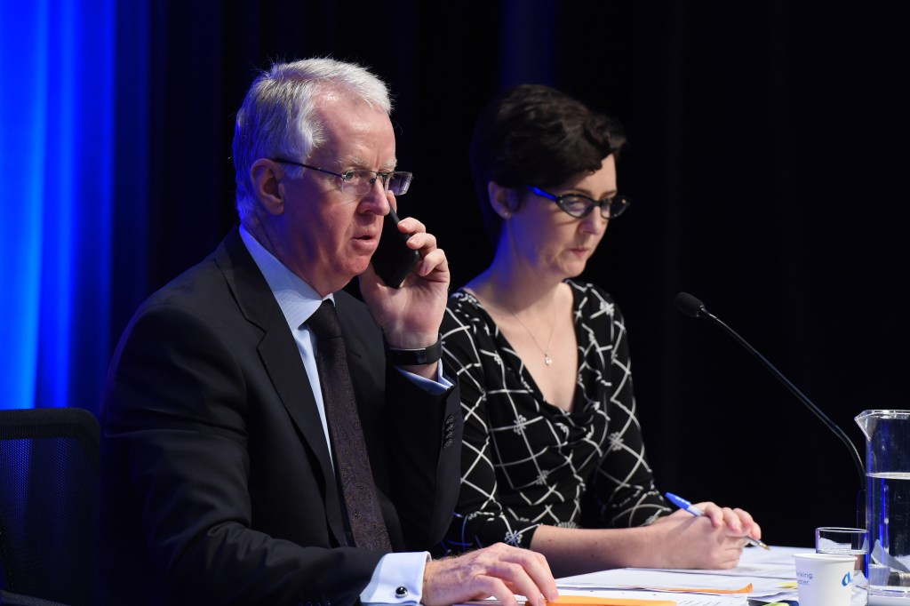 Mark Mentha (left) from KordaMentha with colleague Cassandra Mathews. Photo: AAP/Dean Lewins