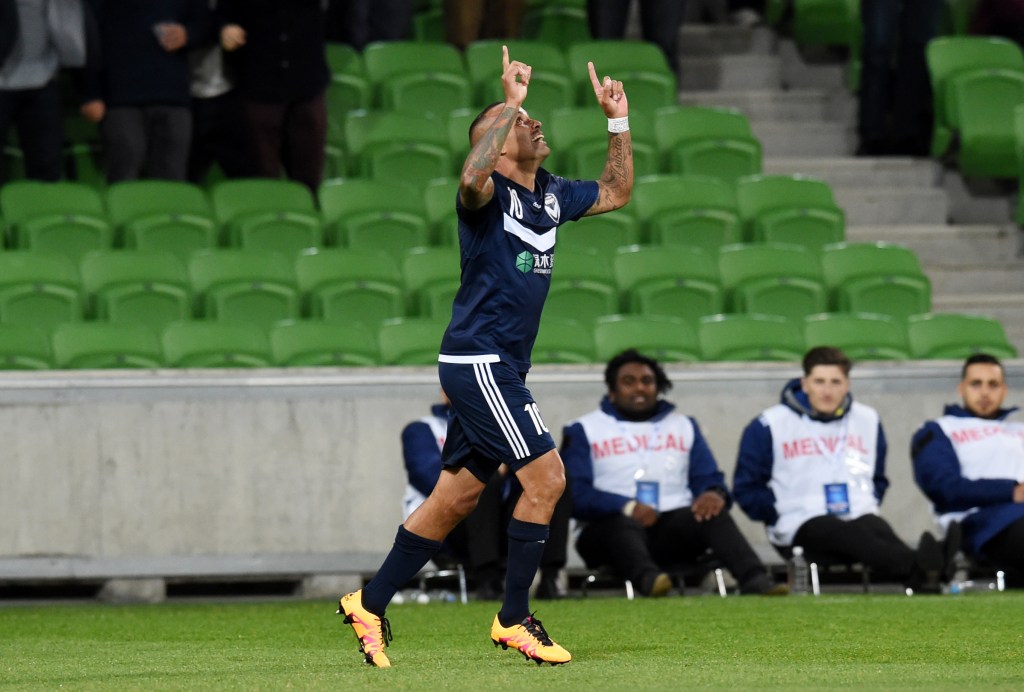 Archie Thompson celebrates after scoring Victory's second goal against Gamba Osaka. Photo: Tracey Nearmy, AAP.