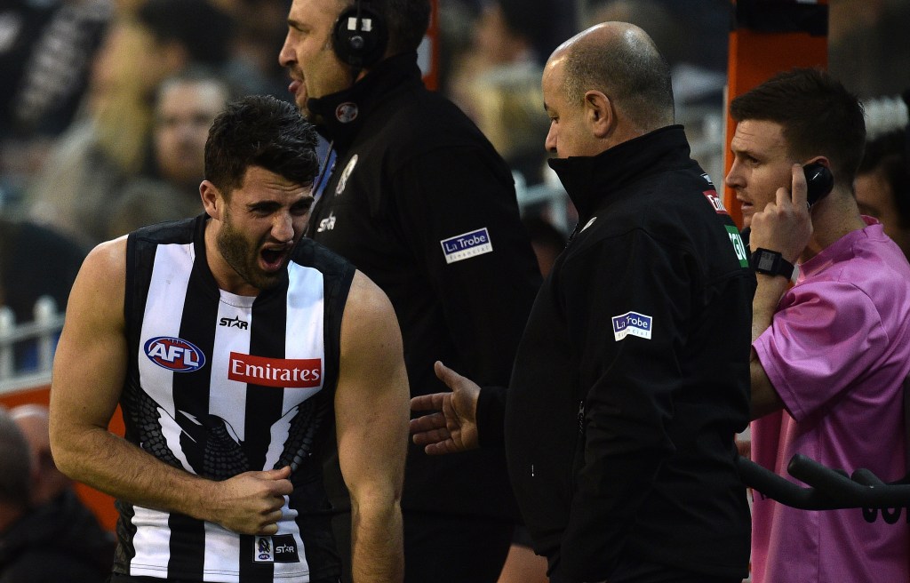 Alex Fasolo was among the walking wounded on the Collingwood bench. Photo: Julian Smith, AAP.