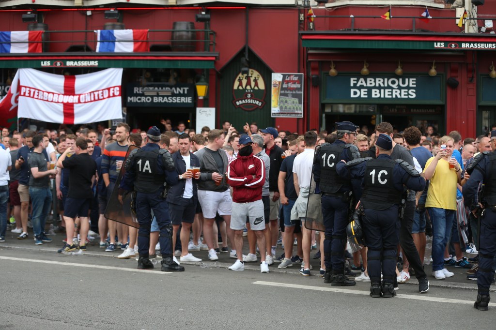 Thumbnail for Dozens arrested as police clash with fans ahead of England match