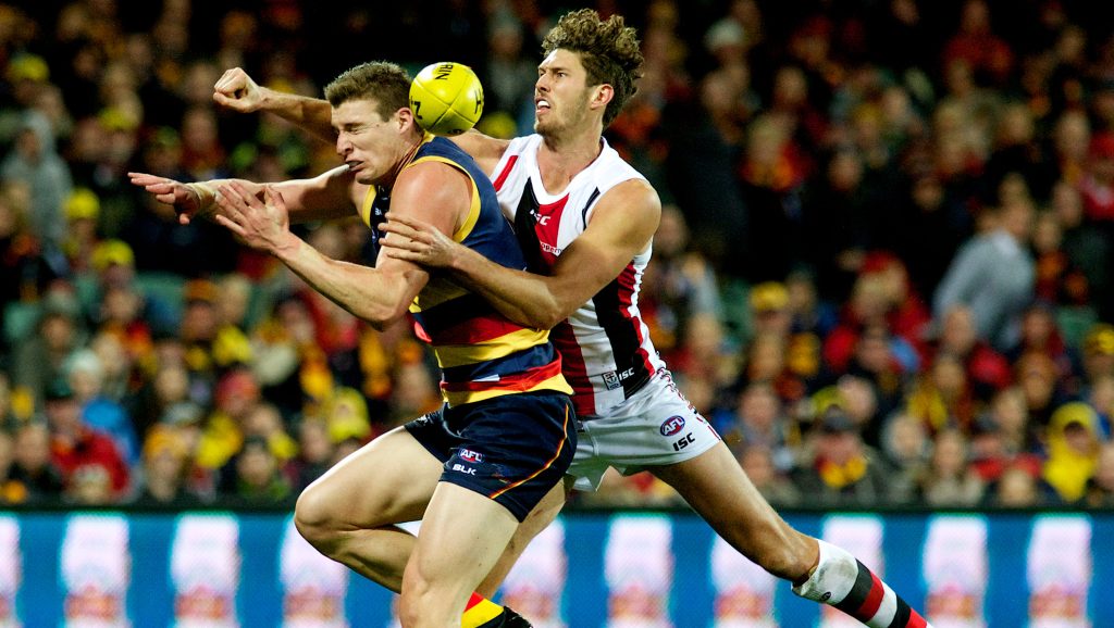 St Kilda's Tom Hickey re-enacting the Crows' contract negotiations with Josh Jenkins. Photo: Michael Errey, InDaily.