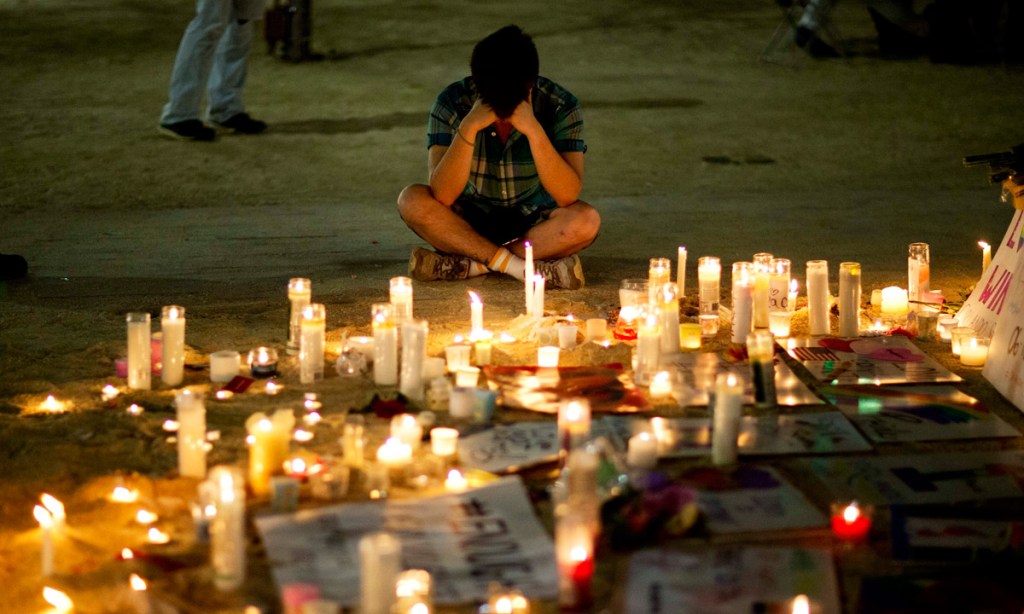 A makeshift memorial for victims of a mass shooting at the Pulse nightclub. Photo: PA 