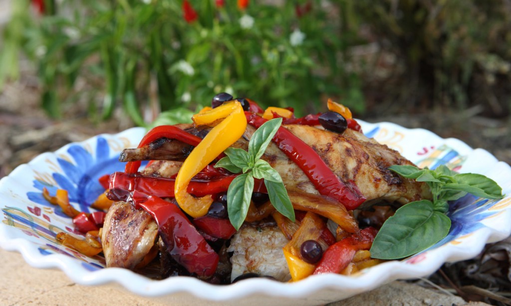 Thumbnail for Roast rabbit with red and yellow capsicums
