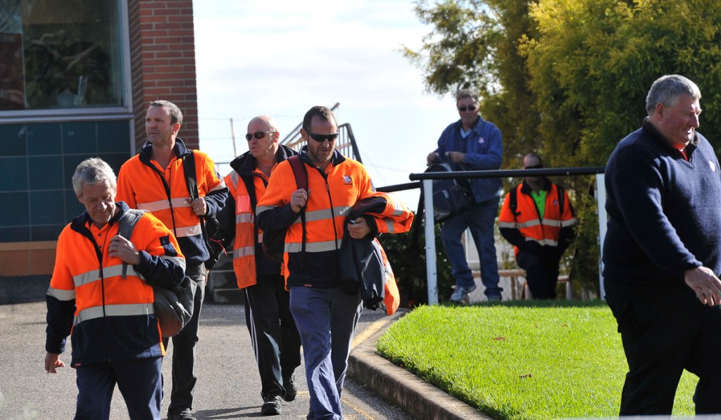 Holden workers finish their shift after staff were retrenched at the company's Elizabeth plant lin 2015. Photo: AAP