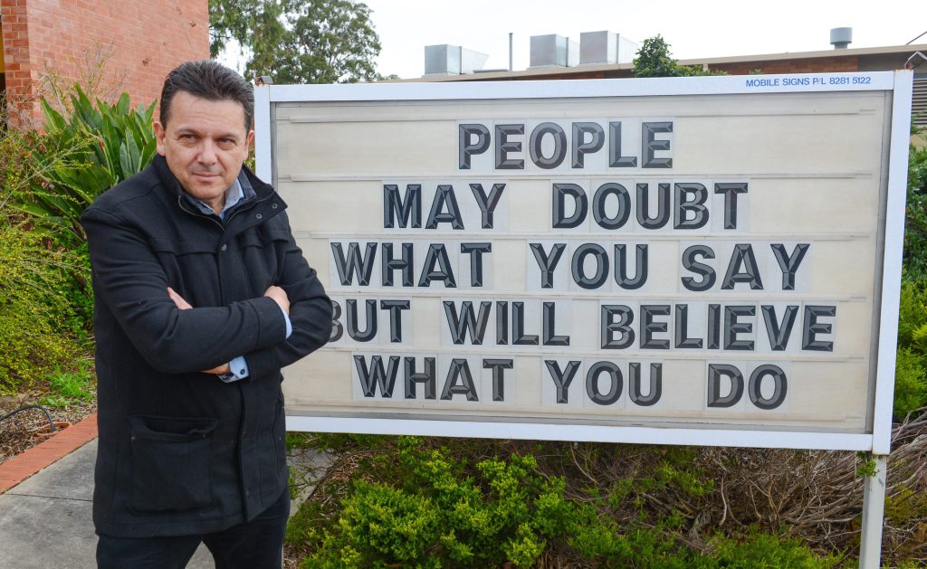 A MESSAGE FROM ON HIGH? Independent Senator Nick Xenophon outside a polling booth at a church in Glynde yesterday. Photo: Brenton Edwards, AAP.
