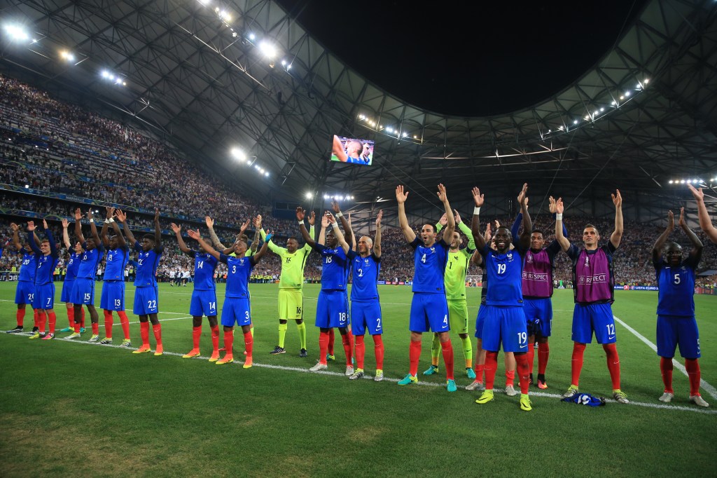 France players celebrate after the final whistle with an Icelandic Clap.