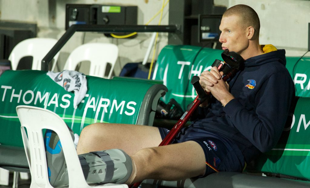 Sam Jacobs cuts a forlorn figure on the bench. Photo: Michael Errey, InDaily.