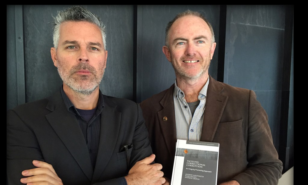 Professor Mark Halsey and Professor Andrew Goldsmith with the new book, Tackling Correctional Corruption (Palgrave Macmillan).