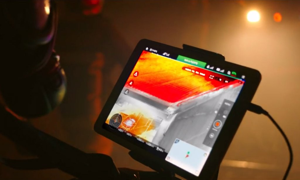 An image from the new Telstra ad, highlighting how the telco can assist emergency services.