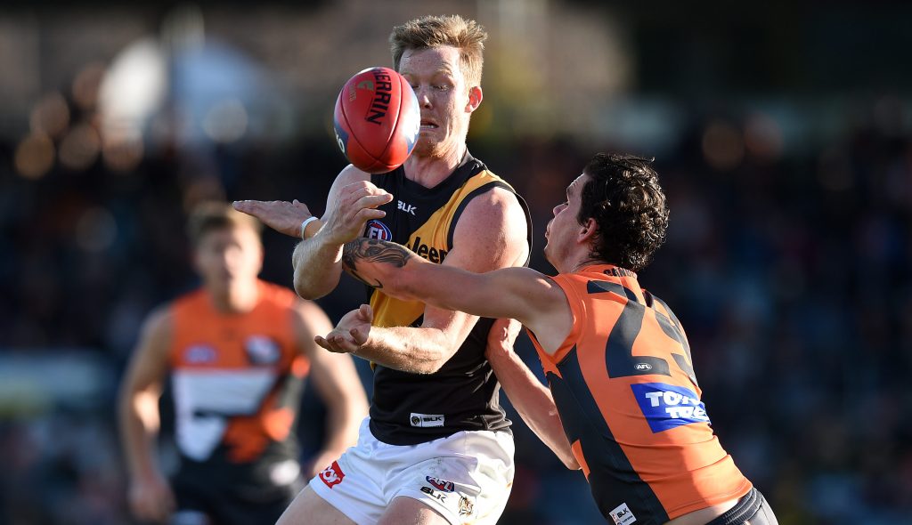 "We're not playing fantasy football here..." Jack Riewoldt is tackled by Giant Zac Williams during Saturday's drubbing. Photo: Dan Himbrechts, AAP.