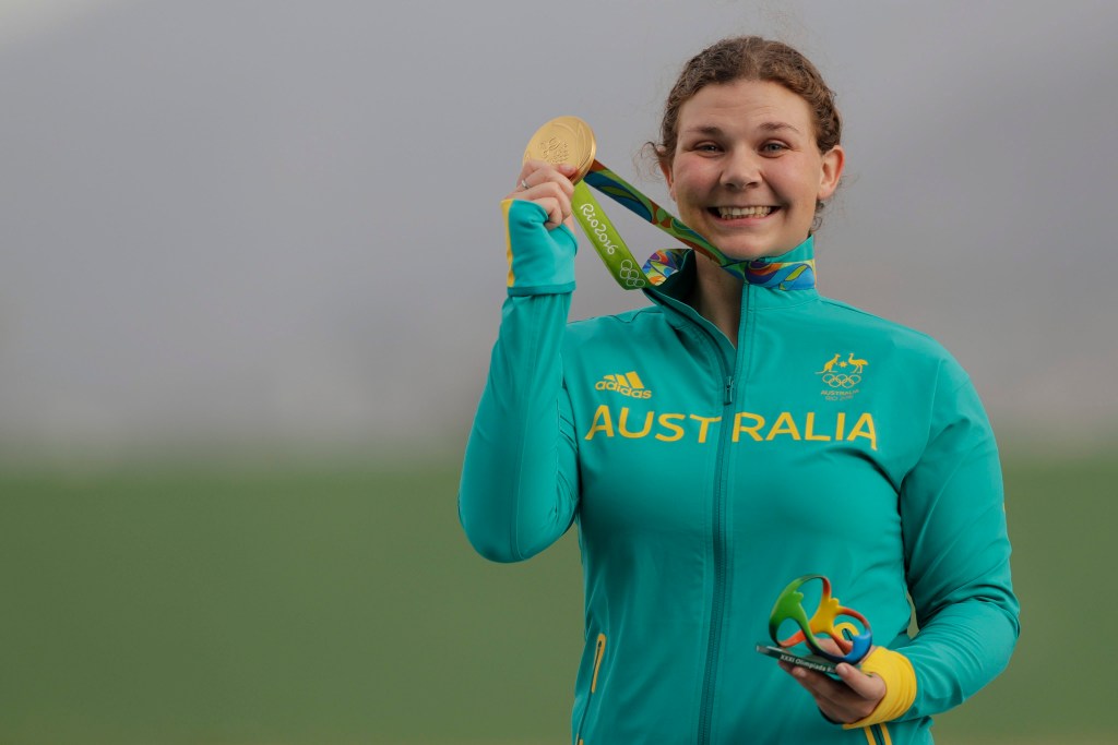 Australian gold medal winner Catherine Skinner celebrates on the podium. Photo: VALDRIN XHEMAJ, EPA.