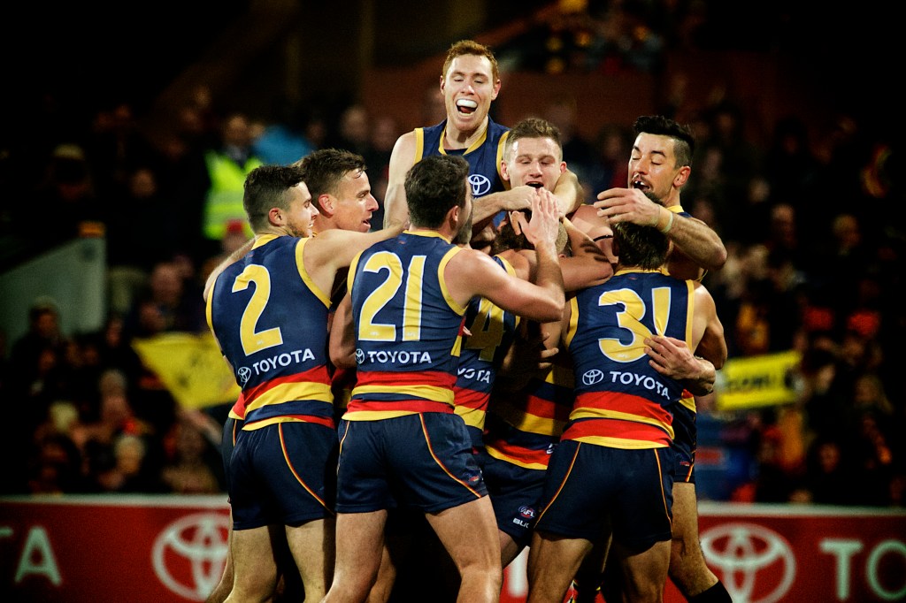 Somewhere in this scrum there is a ruckman who has just kicked his first AFL goal. Photo: Michael Errey, InDaily.