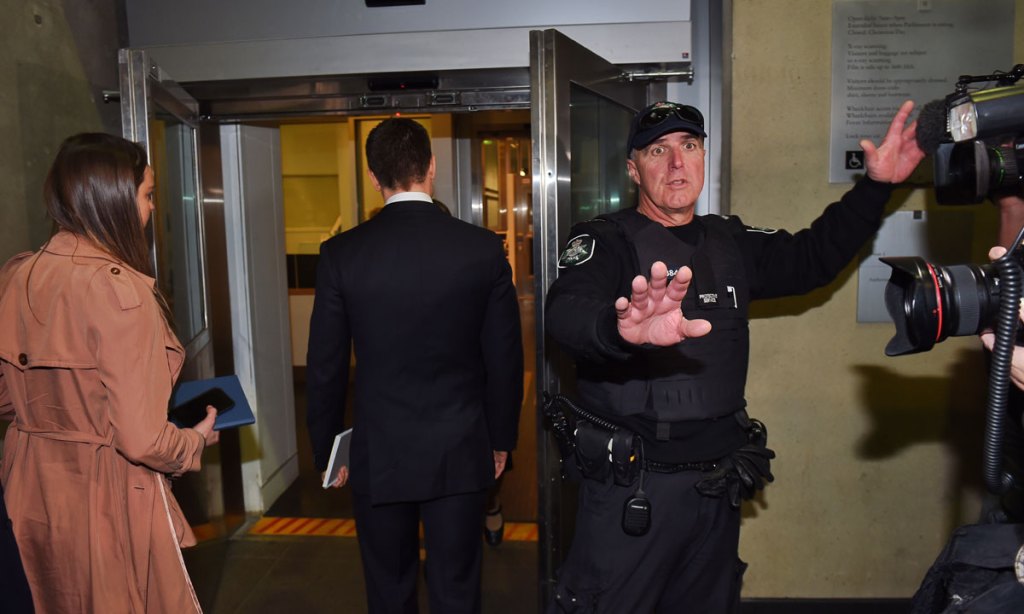 Senator Conroy's staff arrive at Parliament House in Canberra before today's raid. Photo: AAP