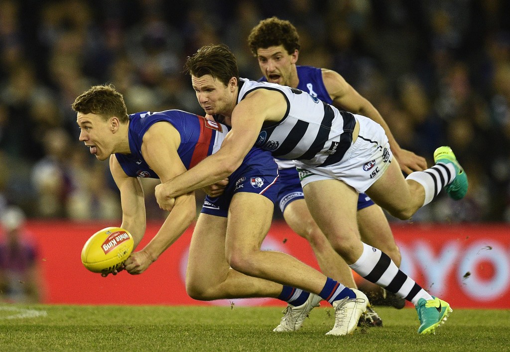 Will Jack Macrae and Patrick Dangerfield tussle again in a Grand Final next week? Photo: Julian Smith / AAP