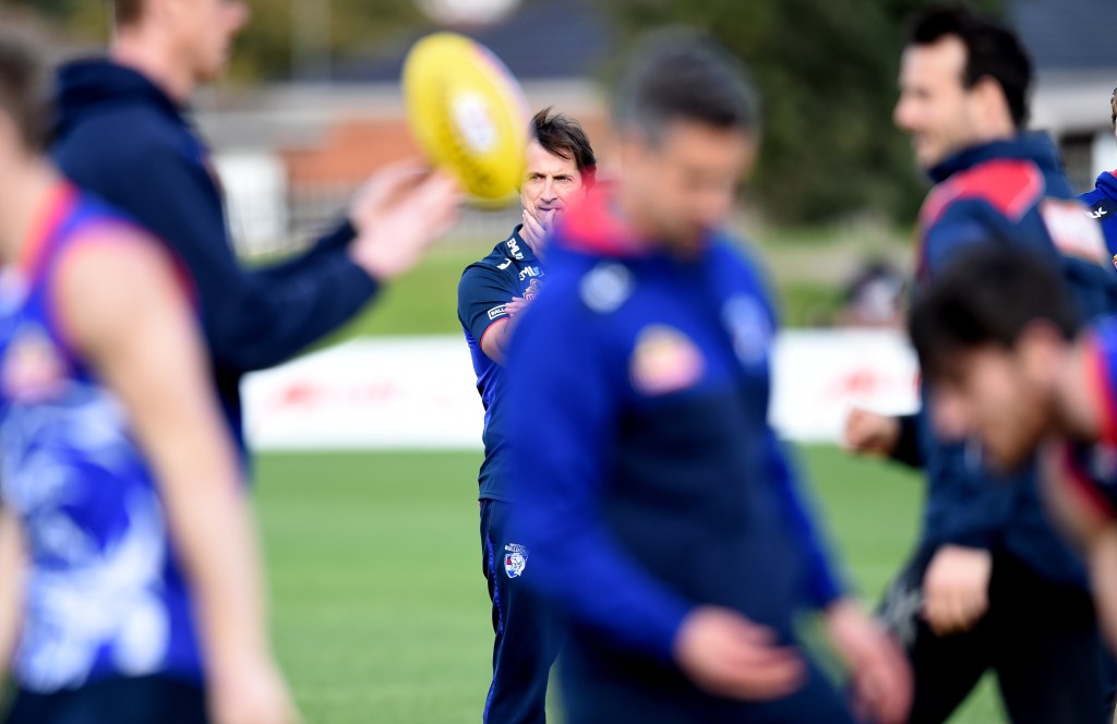 Luke Beveridge watches over a Western Bulldogs training session this week. Photo: Tracey Nearmy / AAP