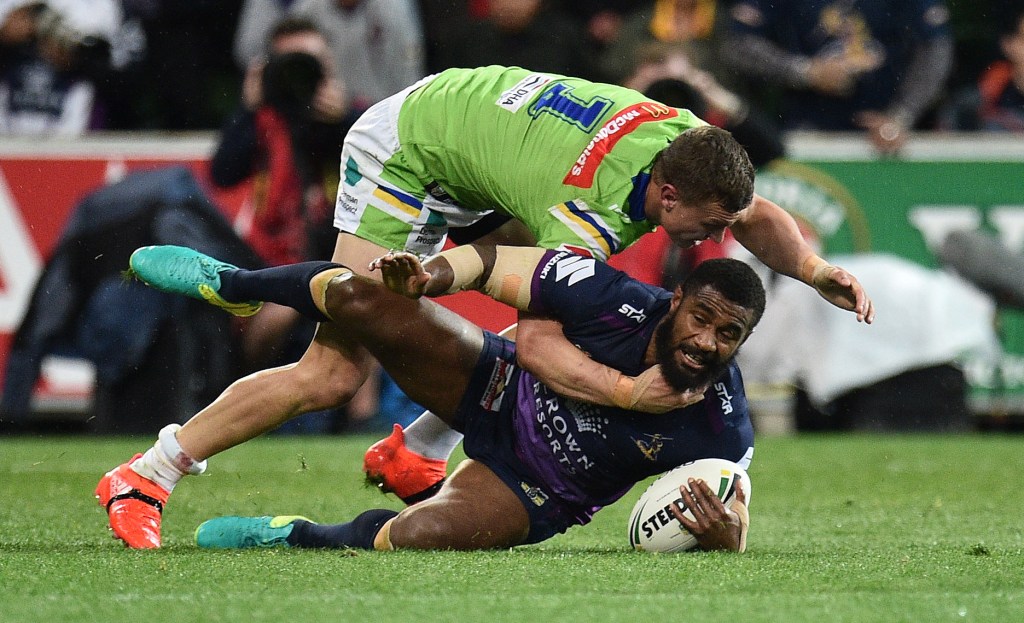 Raider Jack Wighton holds Marika Koroibete, a move that saw him sin binned during Saturday's NRL preliminary final. Photo: Julian Smith / AAP