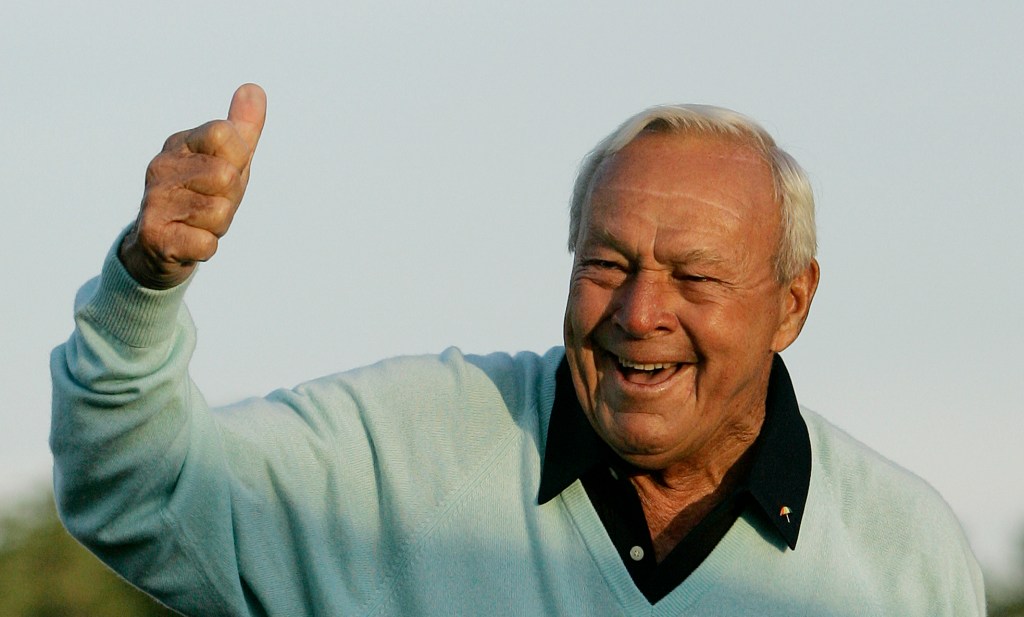 Arnold Palmer acknowledging the crowd after hitting the ceremonial first tee shot before the first round of the 2007 Masters golf tournament at the Augusta National Golf Club. Photo: David J. Phillip / AP