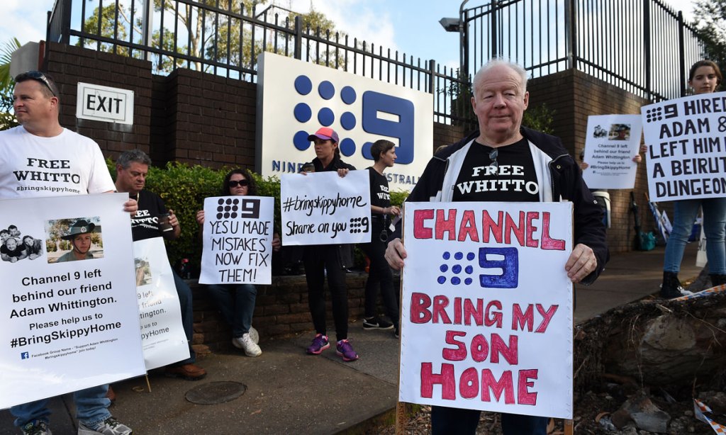 Adam Whittington's father, David, at a protest outside the Channel 9 studios in Sydney before his son was granted bail. Photo: AAP