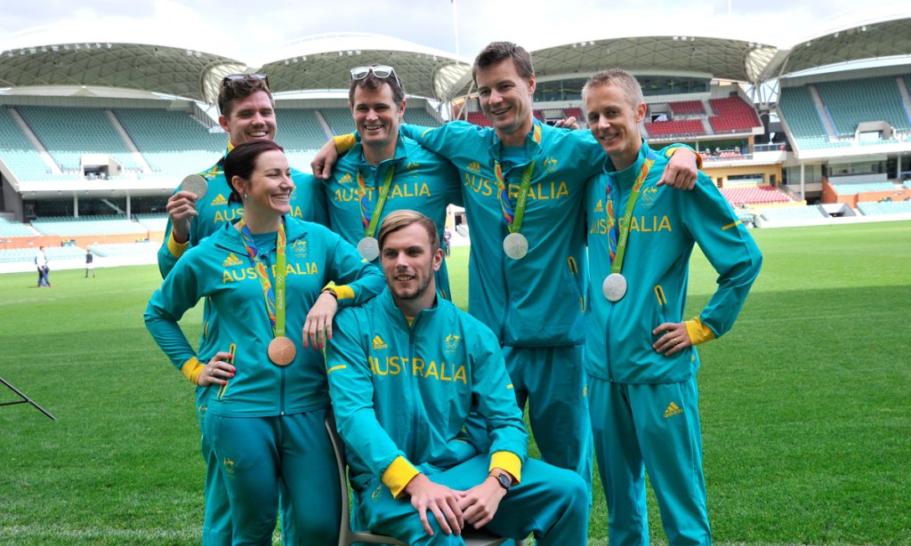 Australian Olympic athletes pose for photos at the Adelaide Oval. Photo: David Mariuz/AAP
