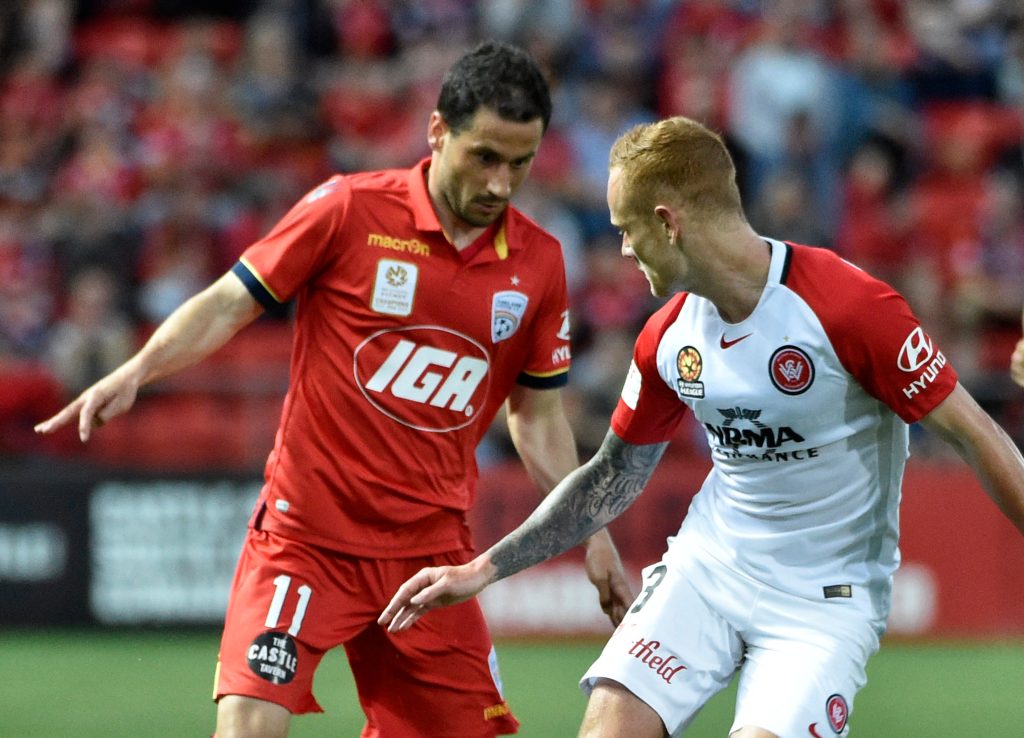 Sergio Cirio tangles with Jack Clisby during Friday's match. Photo: David Mariuz / AAP