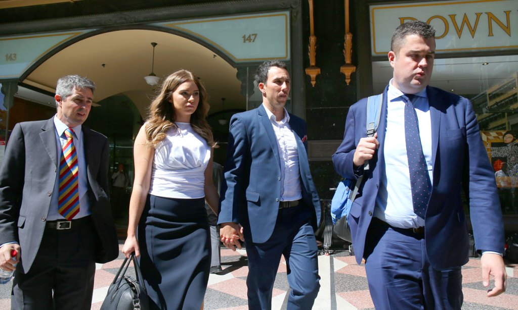 Cricketer Tom Cooper (second from right) leaves the inquest into the death of cricketer Phillip Hughes in Sydney. Photo: AAP