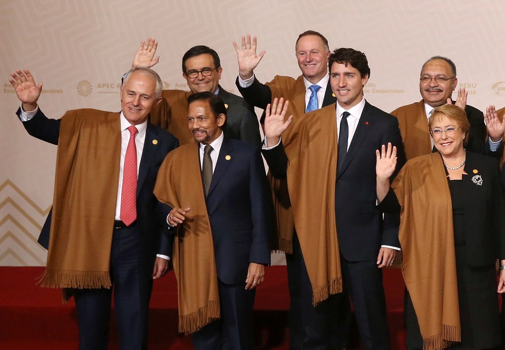 Prime Minister Malcolm Turnbull (far left) with other APEC leaders in Peru on Sunday. Photo: AP/Martin Mejia
