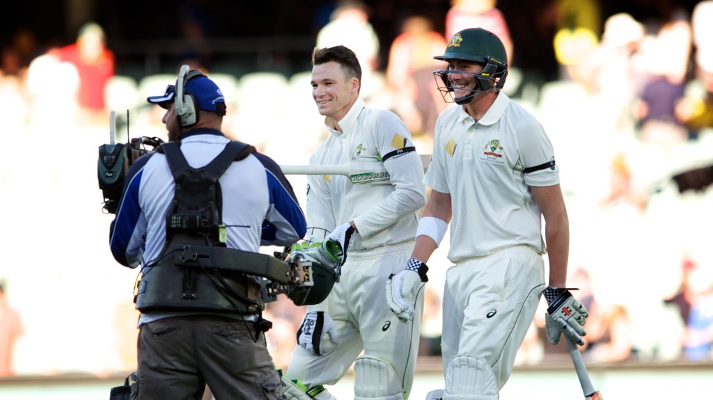 Peter Hanscomb leaves Adelaide Oval victorious with Matt Renshaw. Photo: Michael Errey / AAP